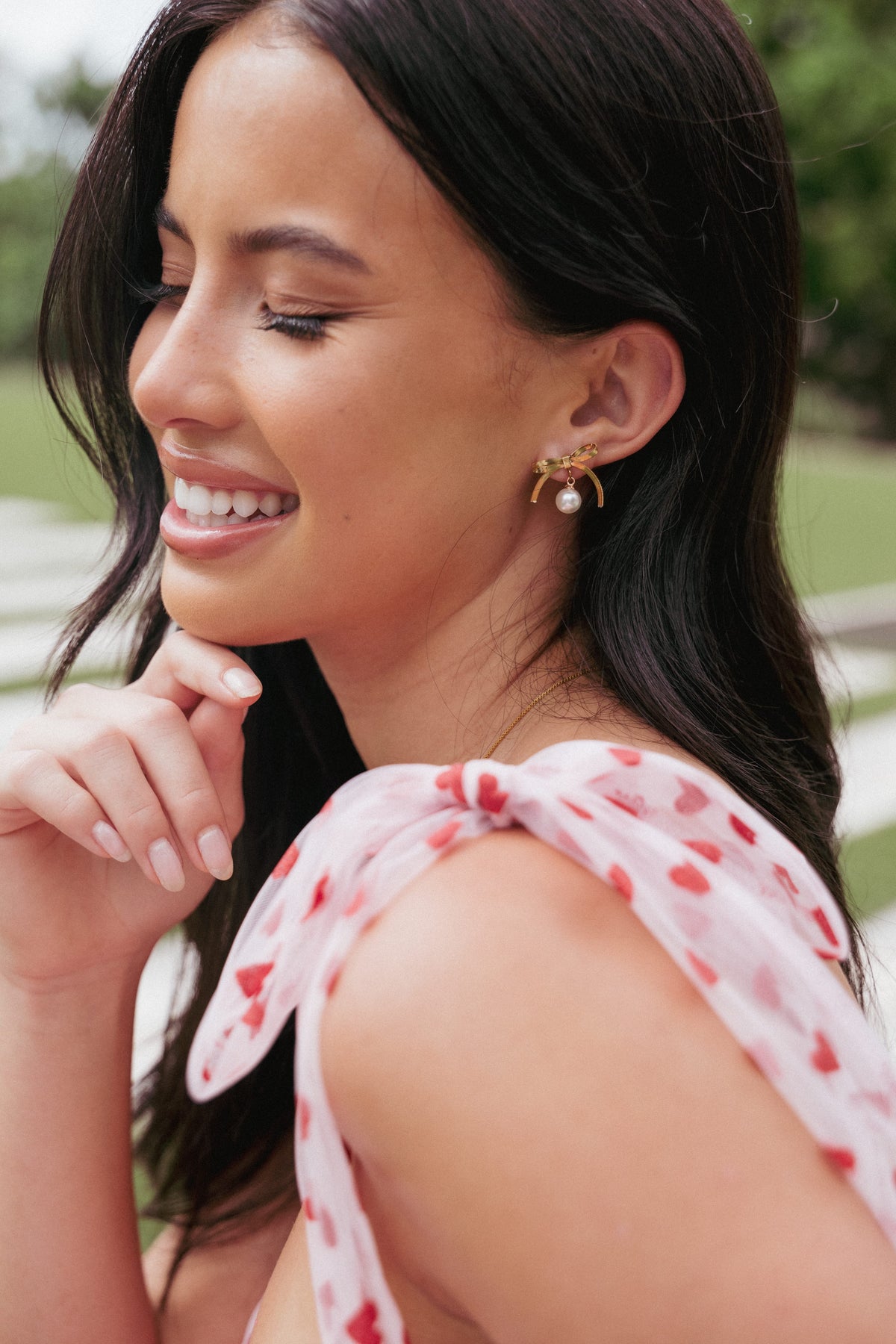 Aurora Bow Earrings in Gold – view 1 of 3