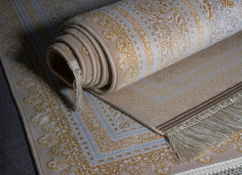 Folded linen fabric on a wooden table