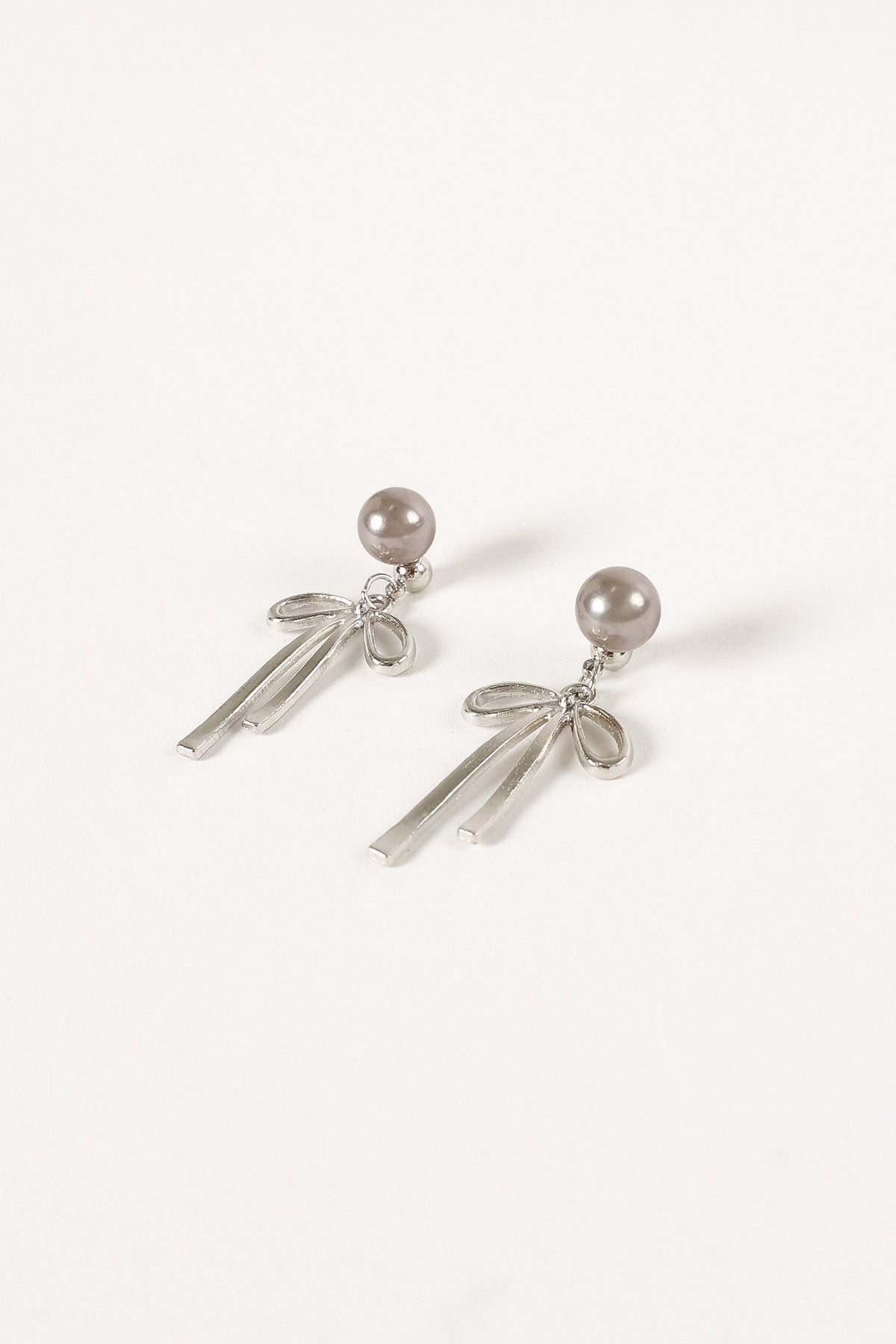 Elena Bow Earrings in Silver – view 1 of 2
