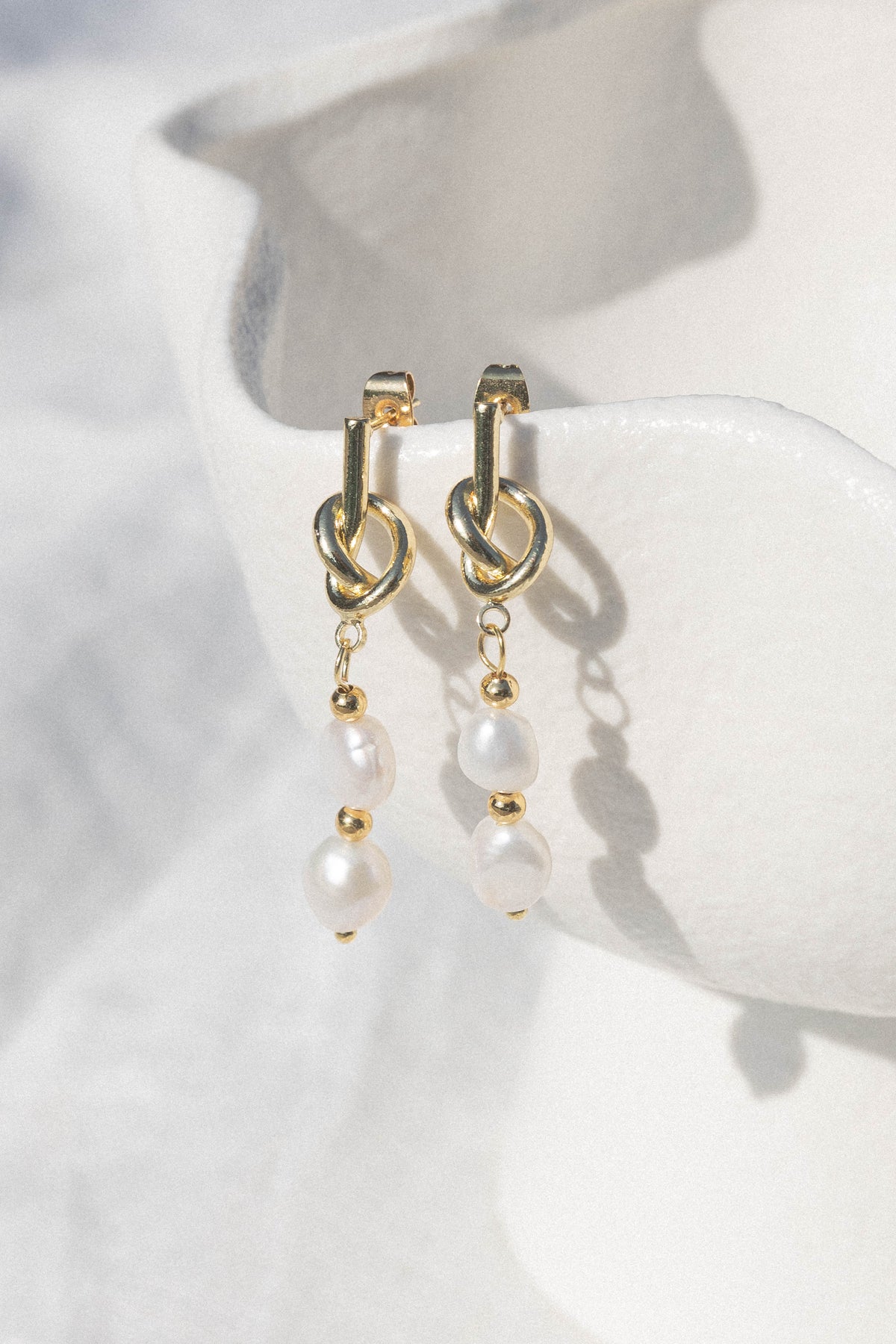 Trixton Pearl Drop Earrings in Gold – view 2 of 2