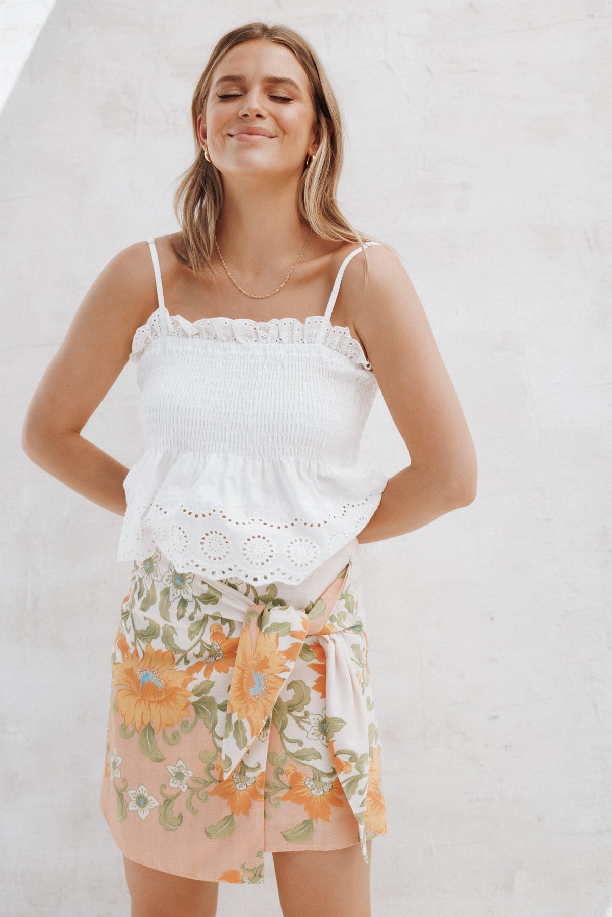 Calypso Wrap Mini Skirt in Yellow Spring Floral – view 1 of 8
