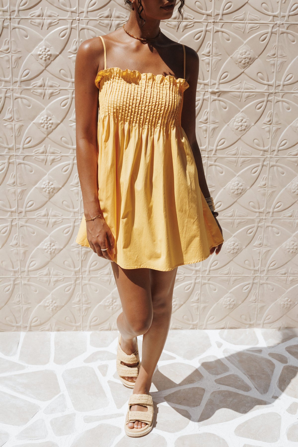 Carson Pleated Mini Dress in Mango – view 1 of 8