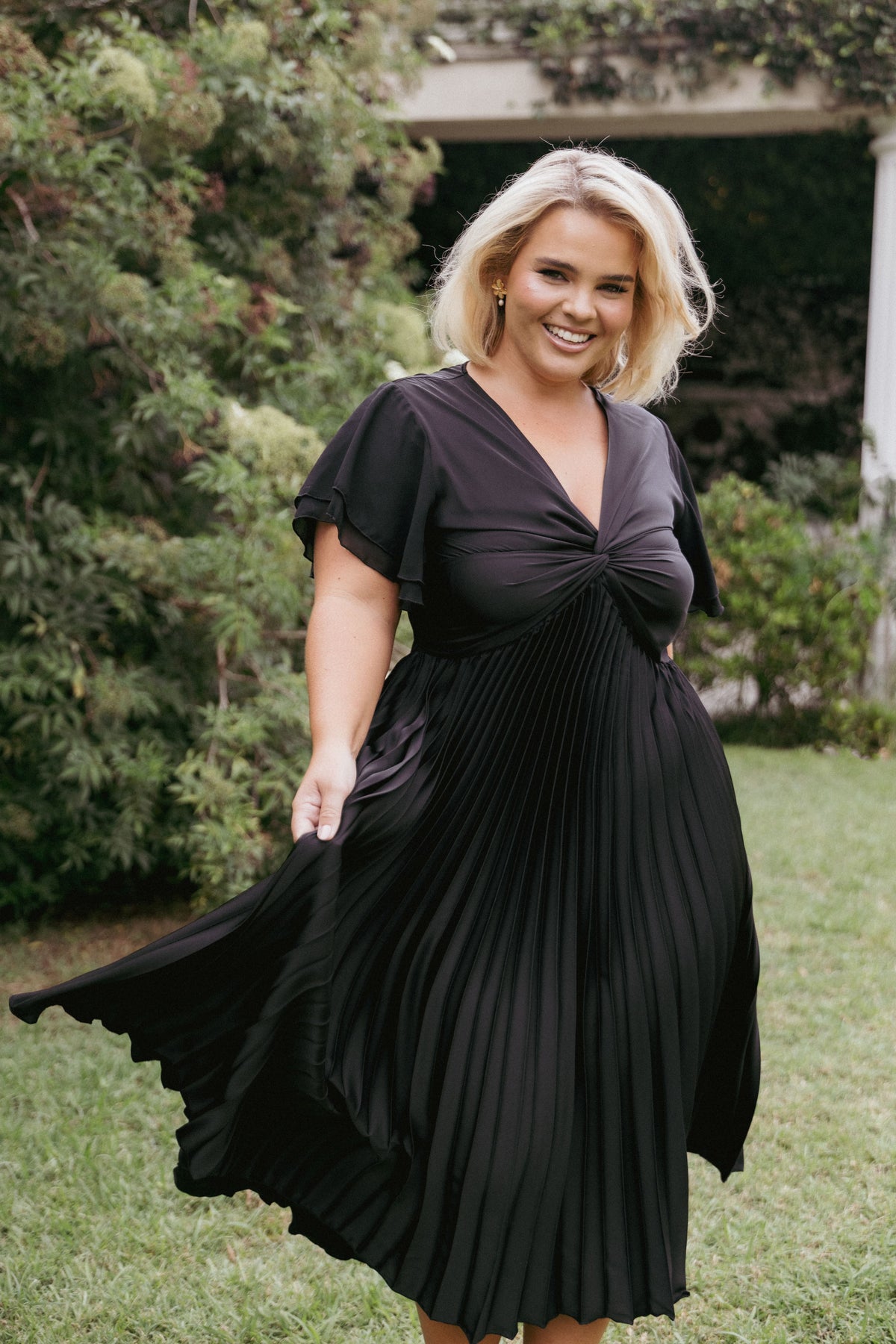 Nova Flutter Sleeve Midi Dress in Black – view 1 of 8