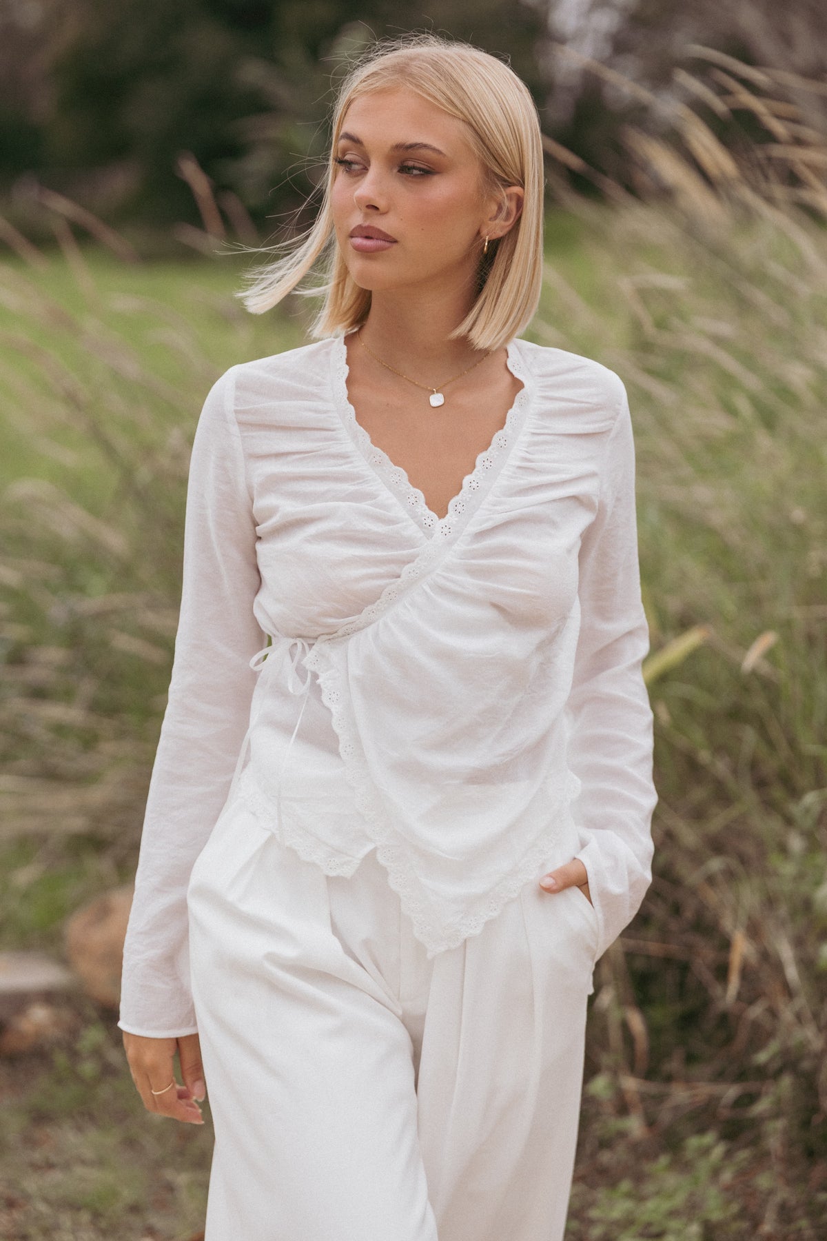 Adira Wrap Blouse in White – view 1 of 9