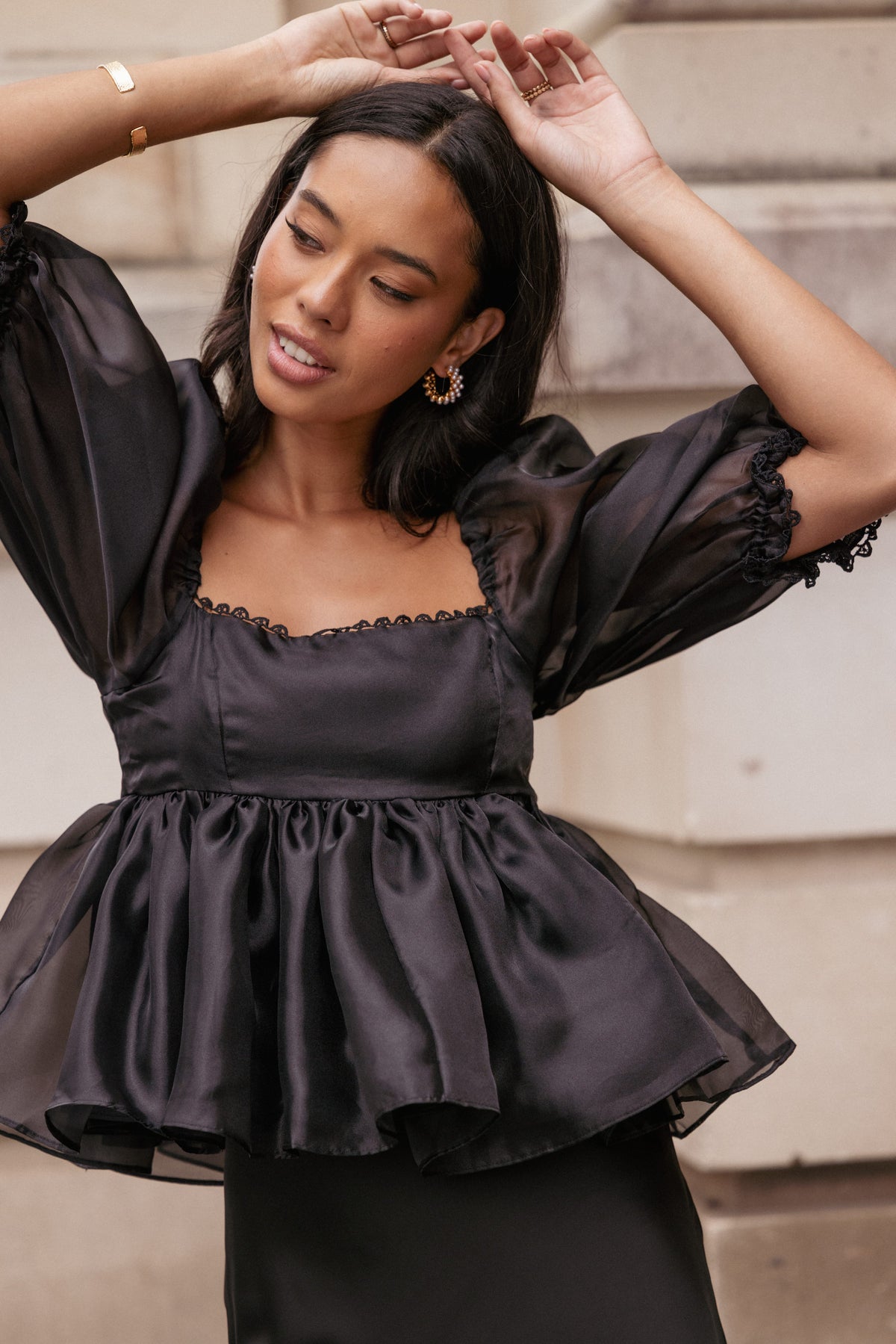 Solenne Puff Sleeve Peplum Organza Top in Black – view 1 of 7